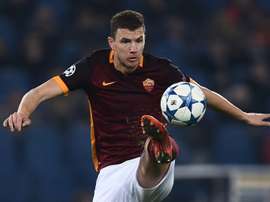 Romas Edin Dzeko, pictured on December 9, 2015, missed a penalty as the Serie A hopefuls lost in the Italian Cup to Spezia