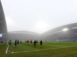 Bolton fans went to the statue of the late Nat Lofthouse at the University of Bolton stadium. AFP