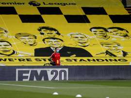 English football grounds have been empty during the coronavirus pandemic. AFP