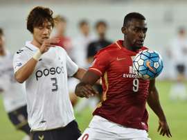 Jackson Martinez of AFC Champions League title-holders Guangzhou Evergrande (right) failed to inspire his side as they drew 0-0 with Pohang Steelers on February 24, 2016