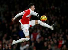 Arsenals midfielder Mesut Ozil has an unsuccessful shot during the English Premier League football match between Arsenal and Bournemouth at the Emirates Stadium in London on December 28, 2015
