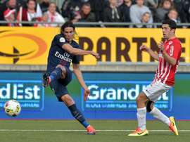 Edinson Cavani (left) scored again as Paris Saint-Germain beat Ligue 1 strugglers Nancy 2-1