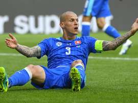 Slovakias defender Martin Skrtel, in action on June 11, 2016, says he will not think twice about tackling his Liverpool team-mate Daniel Sturridge
