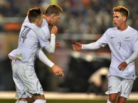 New Zealands Chris Wood (C) celebrates scoring a goal with teammates during a friendly match in Tokyo