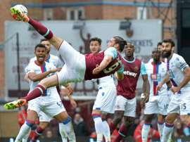 West Ham United's Andy Carroll kicks an unsuccessful shot during their English Premier League match against Crystal Palace, at The Boleyn Ground in Upton Park, east London, on April 2, 2016