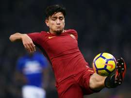 Cengiz gets 10-man Roma back winning. AFP