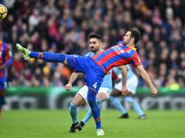Luka Milivojevic got over his penalty woes by notching two against Arsenal. AFP