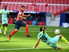 Luis Suarez had an impressive 20-minute debut as Atlético beat Granada 6-1. afp_en