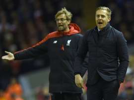 Monk and Klopp managing in 2016. AFP