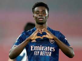 Arsenals Bukayo Saka celebrates scoring against Southampton. AFP