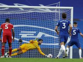 Liverpool's Alisson Becker saved Jorginho's penalty. AFP