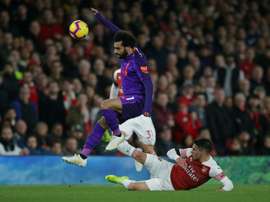Torreira and Salah pictured. AFP