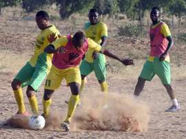 Players of El Kanemi Warriors FC train on a sandy pitch in Maiduguri, on February 2, 2016