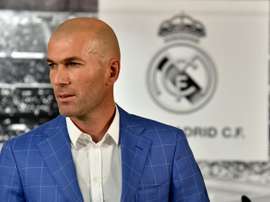 Real Madrids new French coach Zinedine Zidane poses after a statement made by the clubs president, at Santiago Bernabeu stadium in Madrid, on January 4, 2016
