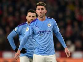 Laporte will play v Real Madrid, says Guardiola. AFP