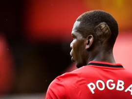 Pogba makes a statement with his hairstyle. AFP