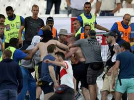 Groups of supporters fight at the end of the Euro 2016 match between England and Russia. BeSoccer