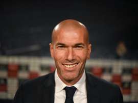 Real Madrids new coach Zinedine Zidane (L) poses before a press conference at the Santiago Bernabeu stadium in Madrid on January 5, 2016