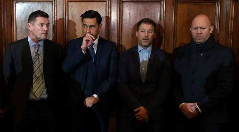 Former footballers and victims of abuse (from L) Mark Williams, Andy Woodward, Steve Walters and Jason Dunford, seen ahead of a press conference in Manchester, on December 5, 2016