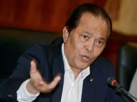 Thai football executive Worawi Makudi answers questions during a 2012 press conference in Bangkok