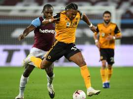 Liverpool are still interested in Adama Traore (C). AFP