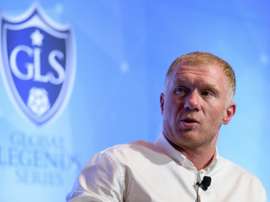 Paul Scholes has earmarked their rival's top stars as players his side are missing. AFP
