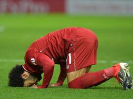 Salah celebrates scoring against Watford. AFP