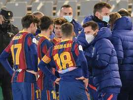 Koeman is hopeful Messi (R) will be able to face Athletic Bilbao. AFP