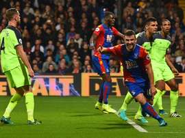 James McArthur might join Burnley. AFP