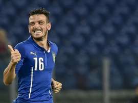 Italys midfielder Alessandro Florenzi celebrates after scoring during the Euro 2016 qualifying football match between Italy and Norway at Romes Olympic stadium on October 13, 2015