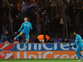 Zenits Russian midfielder Oleg Shatov celebrates after scoring during an UEFA Champions League match against Valencia at the Petrovsky stadium in St Petersburg on November 24, 2015