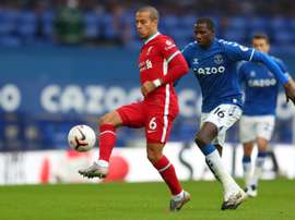 Thiago Alcantara (L) is not yet ready to return to action for Liverpool. AFP