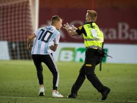 La Liga takes legal action against pitch invader. AFP