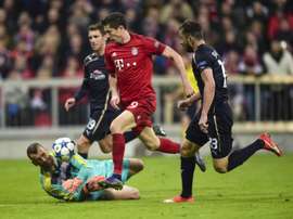 Bayern Munichs Robert Lewandowski (C) grabbed five goals against Wolfsburg last week, two more against Mainz last weekend and claimed a hat-trick in a mid-week win against Dinamo Zagreb in the Champions League