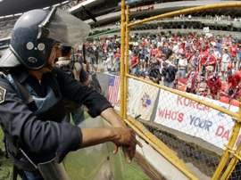 USSF say hostile atmosphere mean USA men's team deserve more money than the women's side. AFP