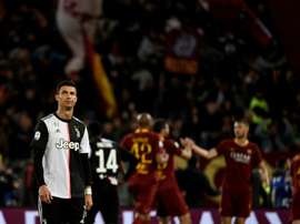 Florenzi, Dzeko keep Roma's Champions League hopes alive