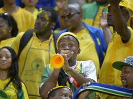 A Mamelodi Sundowns fan blows a vuvuzela prior to the CAF Champions League final. AFP