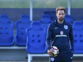 Southgate leads an England training session. AFP