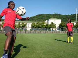 African 'twin sisters' tackle Chinese football together. AFP