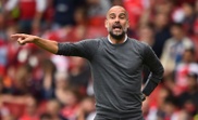 Manchester City boss Pep Guardiola barks out orders to his players. AFP