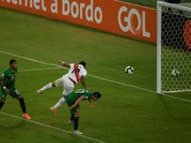 Farfan (c) scored one of Peru's goals v Bolivia. AFP
