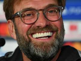 Klopp will stay on at Anfield. AFP