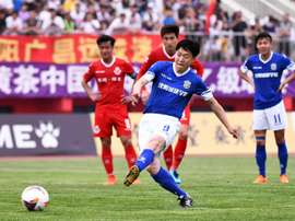 The 44-year-old became the oldest goalscorer in Chinese professional football history. AFP