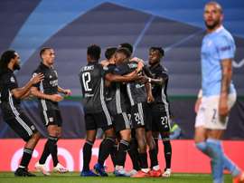 Moussa Dembele scored twice Lyon beat Man City to reach the Champions League semis. AFP