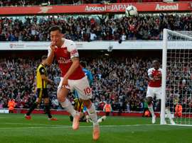 Ozil led Arsenal to victory on Monday night. AFP