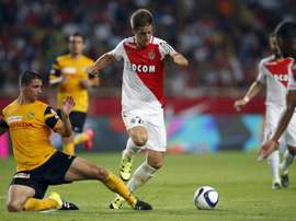 Monaco's Croatian midfielder Mario Pasalic (R) vies with Young Boys' Czech defender Jan Lecjaks (L) during the UEFA Champions League third qualifying round second leg football match on August 4, 2015 at the Louis II Stadium in Monaco