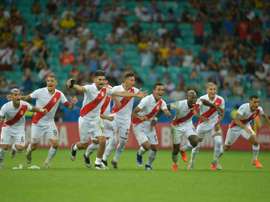 Peru will go through to the semi-final against Chile after a dramatic penalty shootout. AFP