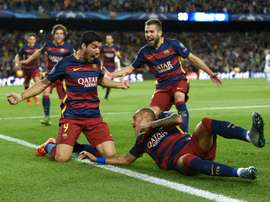 Barcelonas Luis Suarez (C-L) celebrates scoring a goal with teammates, during their UEFA Champions League Group E match against Bayer Leverkusen, at the Camp Nou stadium in Barcelona, on September 29, 2015