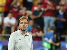 Klopp is wary of getting ahead of himself in regards to the title race. AFP