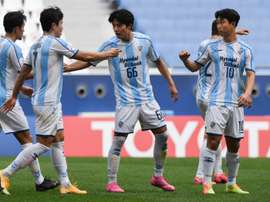 Yoon Bit-garam (R) scored twice as Ulsan qualified for the AFC CL last 16. AFP